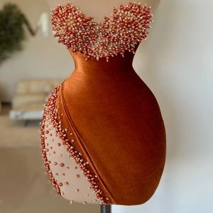 Burnt orange beaded breast cocktail dress